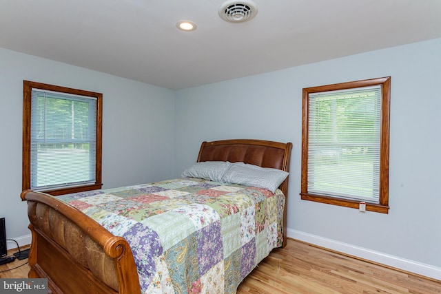 bedroom featuring light hardwood / wood-style floors