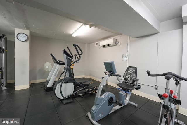 workout room featuring a wall mounted AC