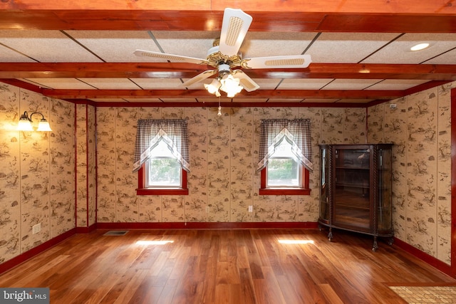 spare room featuring ceiling fan and wood-type flooring