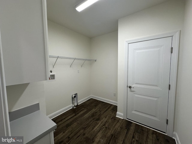 laundry area featuring washer hookup, dark hardwood / wood-style floors, and electric dryer hookup