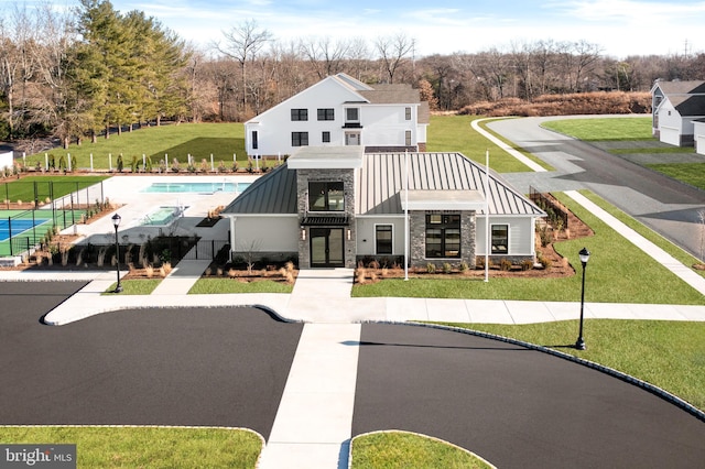 exterior space with a front yard