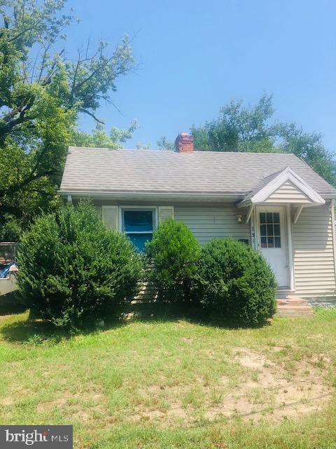 view of home's exterior with a yard