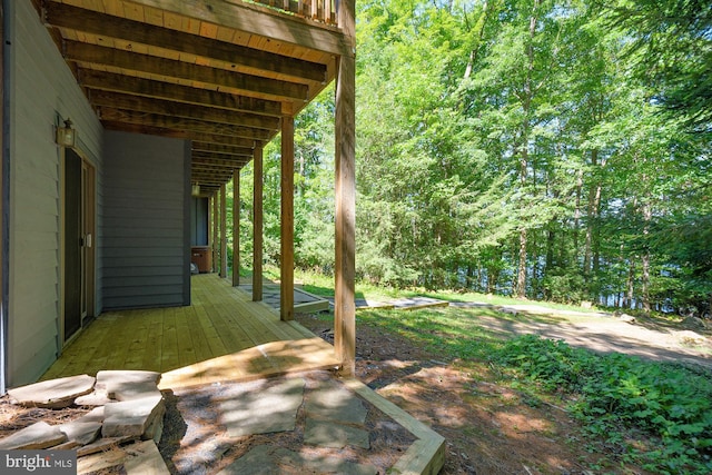 view of yard with a wooden deck