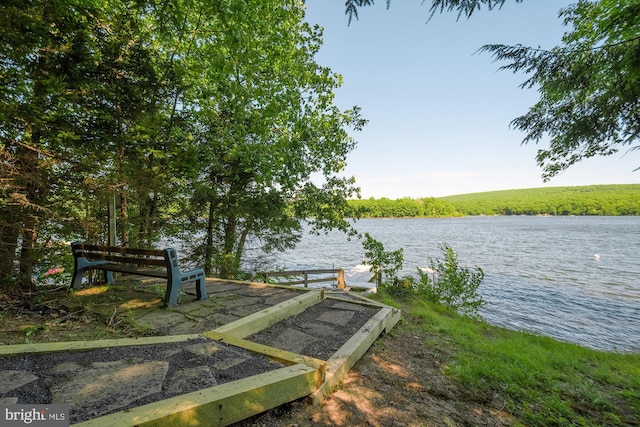 view of dock with a water view