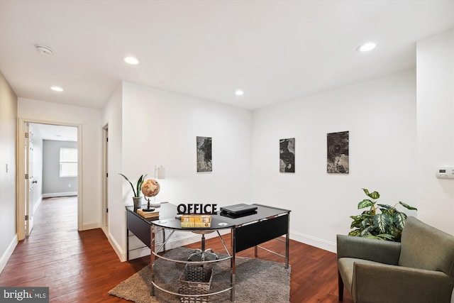 office with dark wood-type flooring