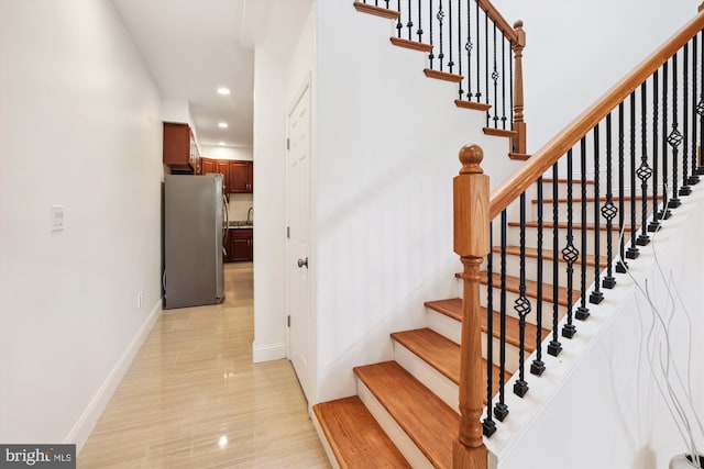 staircase with sink