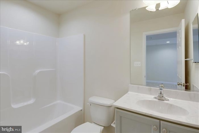 full bathroom featuring bathtub / shower combination, vanity, and toilet