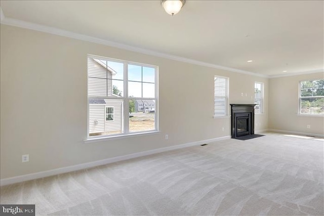 unfurnished living room with light carpet and crown molding