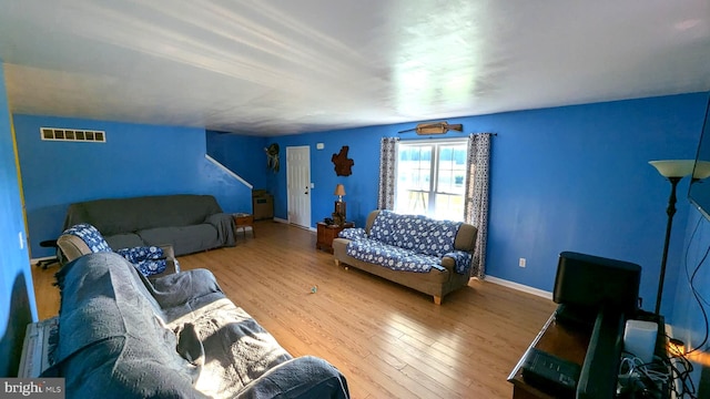 living room featuring hardwood / wood-style floors