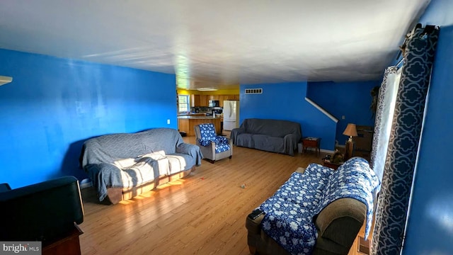 living room with light wood-type flooring