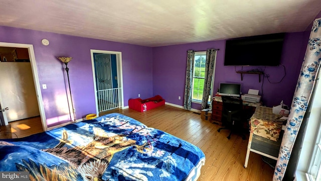 bedroom featuring hardwood / wood-style floors