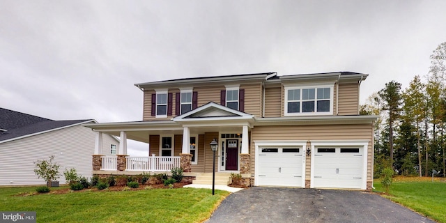 46210 Stasha Ct, Drayden, MD 20630 - craftsman house featuring a front lawn, a porch, and a garage