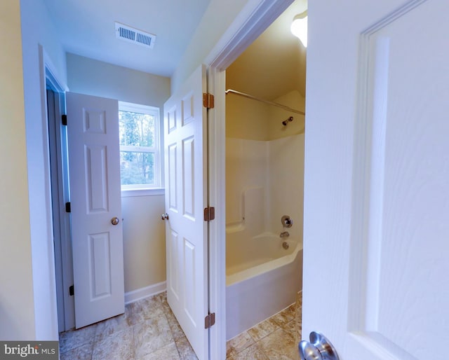 bathroom featuring  shower combination