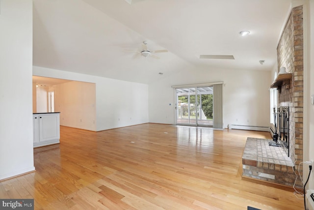 unfurnished living room with lofted ceiling, ceiling fan, a baseboard radiator, and light hardwood / wood-style floors