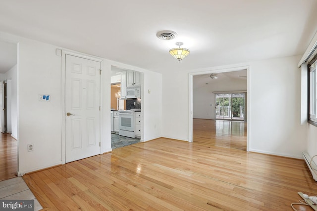 interior space with light hardwood / wood-style floors