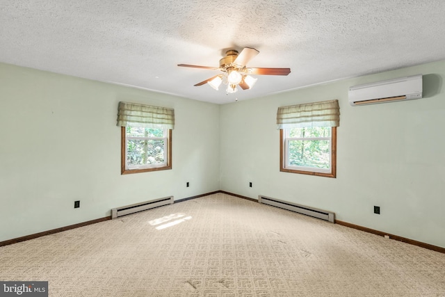 empty room with baseboard heating, carpet flooring, an AC wall unit, and ceiling fan