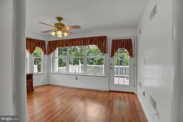 interior space featuring a wealth of natural light and ceiling fan