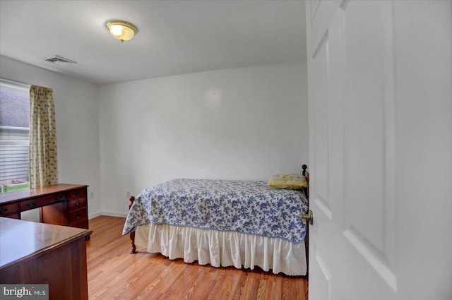 bedroom with light hardwood / wood-style floors