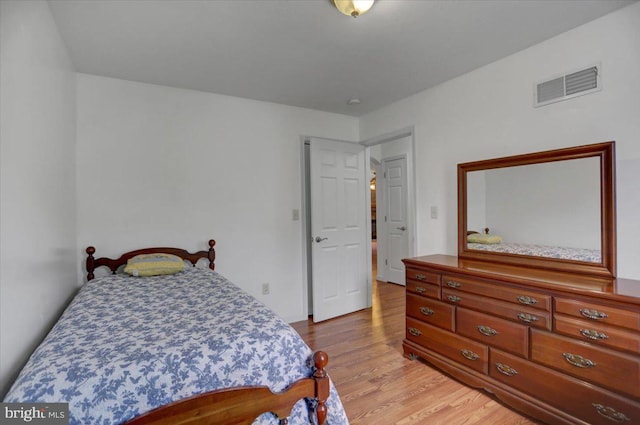 bedroom featuring light hardwood / wood-style floors