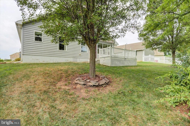 view of yard with a deck