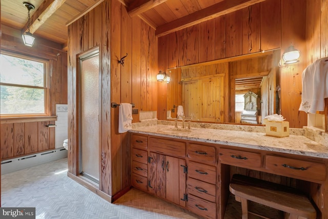 bathroom with vanity, wood walls, a baseboard radiator, beamed ceiling, and wood ceiling