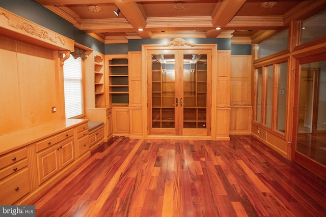 interior space with hardwood / wood-style floors, french doors, ornamental molding, and beam ceiling