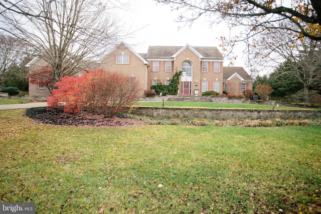 view of front of home with a front yard