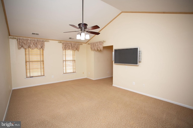 unfurnished room featuring ceiling fan, carpet, lofted ceiling, and ornamental molding