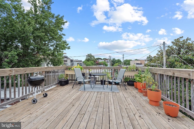 deck featuring a grill