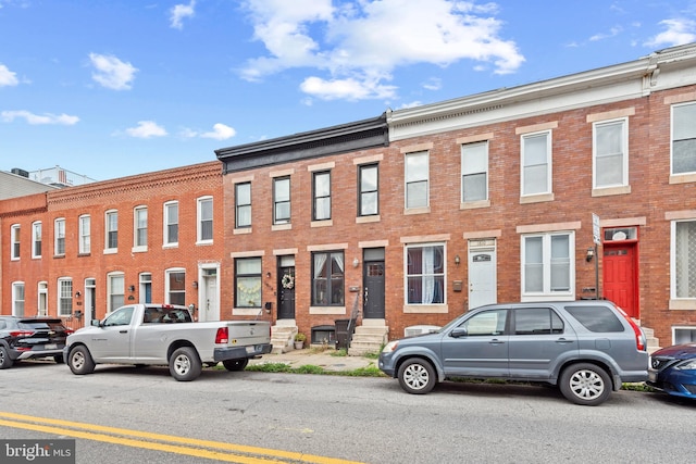 multi unit property featuring brick siding