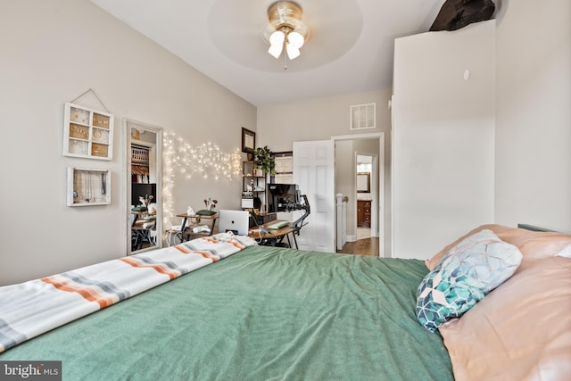 bedroom featuring ceiling fan and a closet