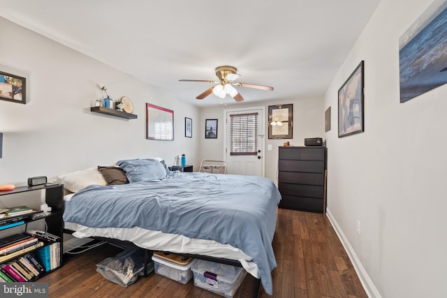 bedroom featuring ceiling fan and dark wood-type flooring