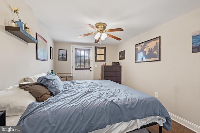 bedroom featuring ceiling fan and wood-type flooring