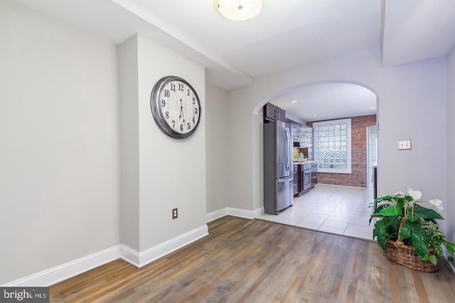 hallway featuring light hardwood / wood-style flooring