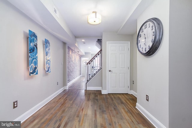 hall featuring dark wood-type flooring