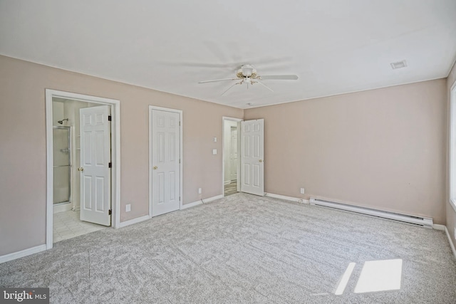 unfurnished bedroom featuring ceiling fan, a baseboard radiator, light colored carpet, and ensuite bathroom