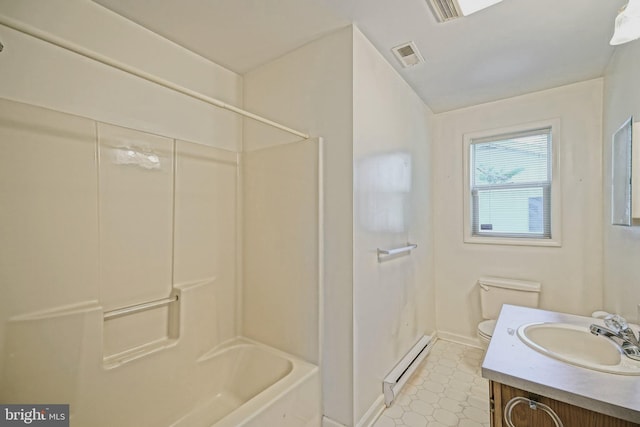 full bathroom with tub / shower combination, a baseboard heating unit, vanity, and toilet