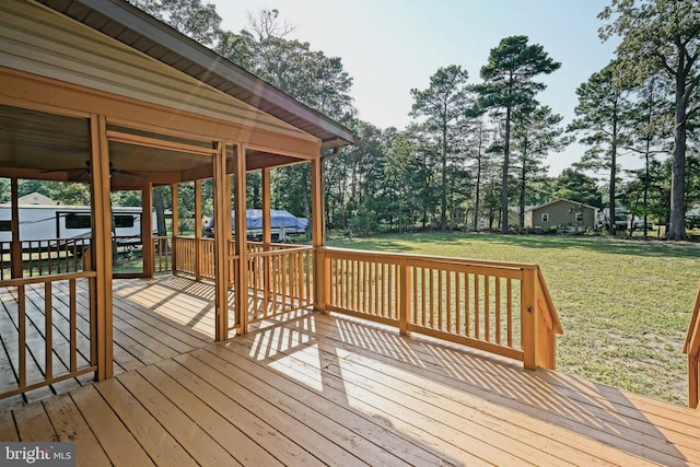 deck featuring a yard