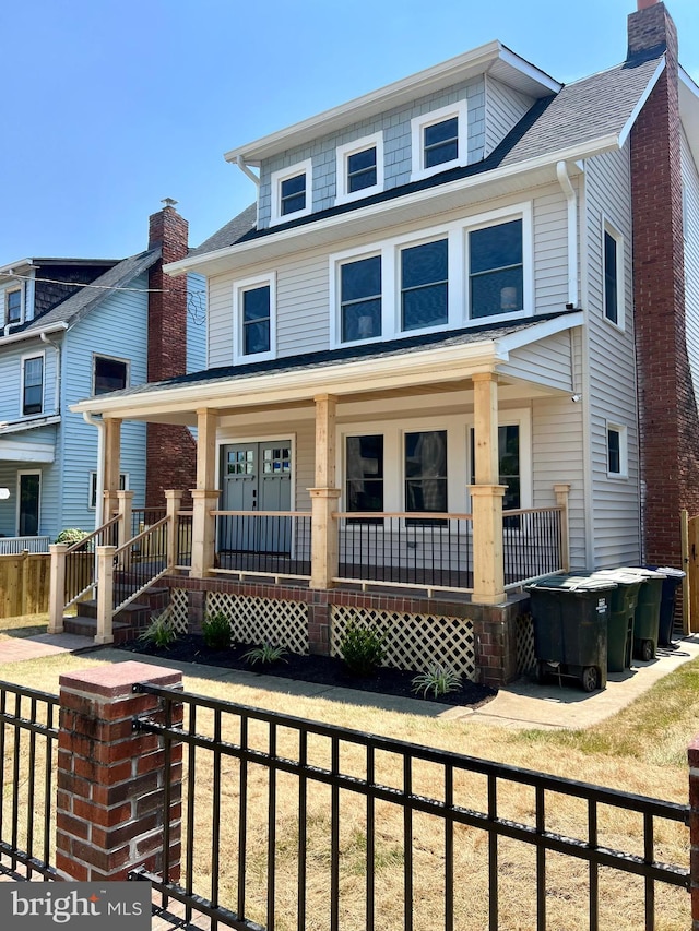 view of front of property featuring covered porch