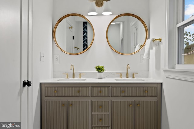 bathroom with dual vanity