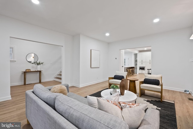 living room featuring light wood-type flooring