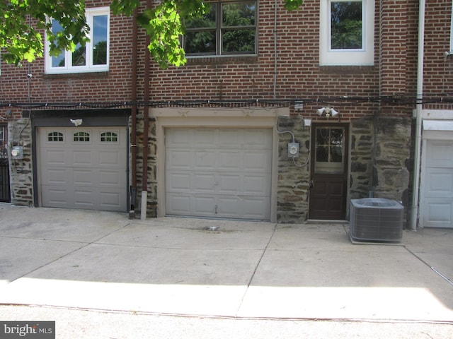 garage featuring central air condition unit