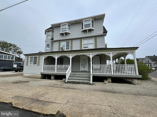 view of front of home featuring covered porch