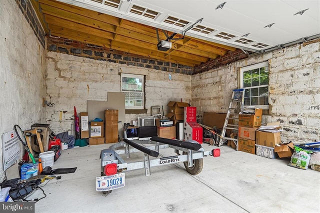 garage featuring a garage door opener