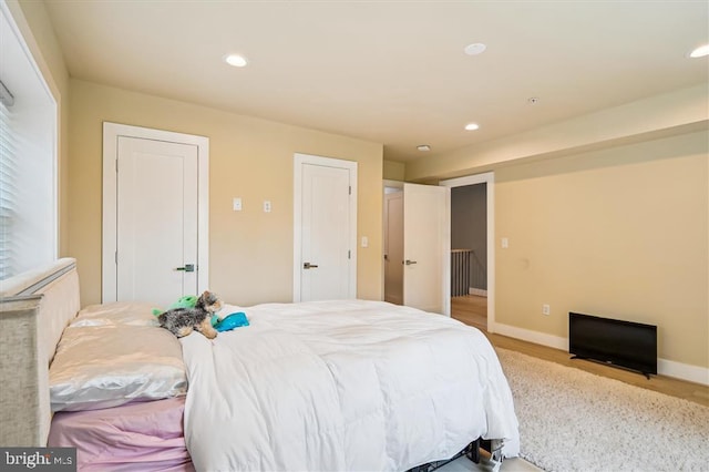 bedroom with light wood-type flooring