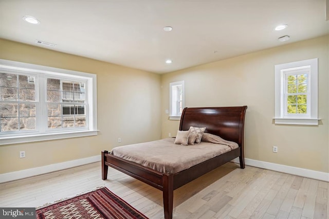 bedroom featuring light wood-type flooring