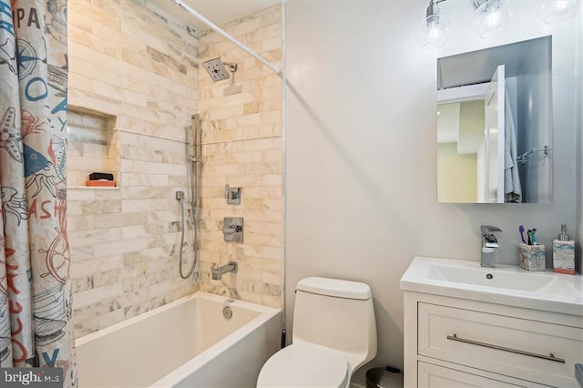 full bathroom featuring toilet, shower / bath combination with curtain, and vanity