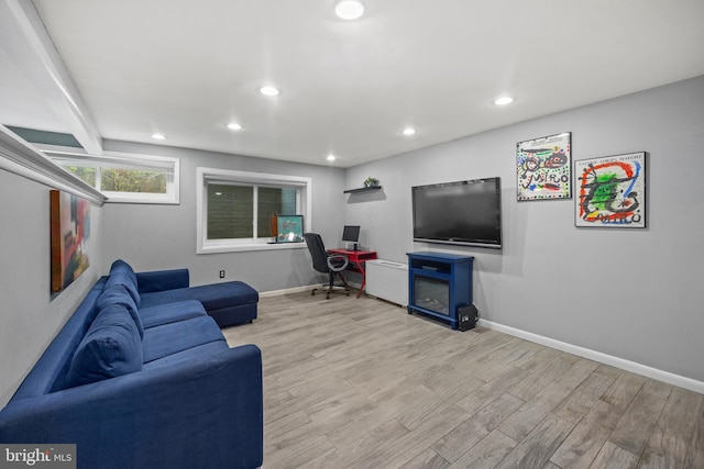 living room with light hardwood / wood-style floors