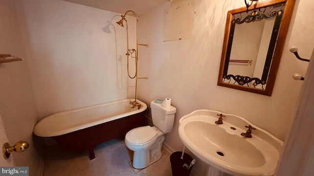 bathroom with shower / bathtub combination and toilet