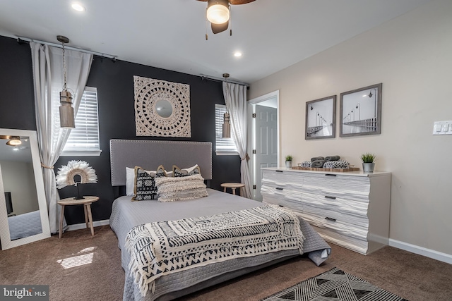 bedroom with carpet, multiple windows, and ceiling fan